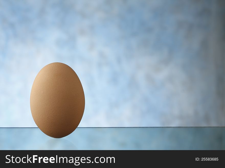 Egg  on glass with blue sky background