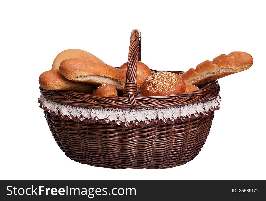 Arrangement of bread in basket isolated on white background