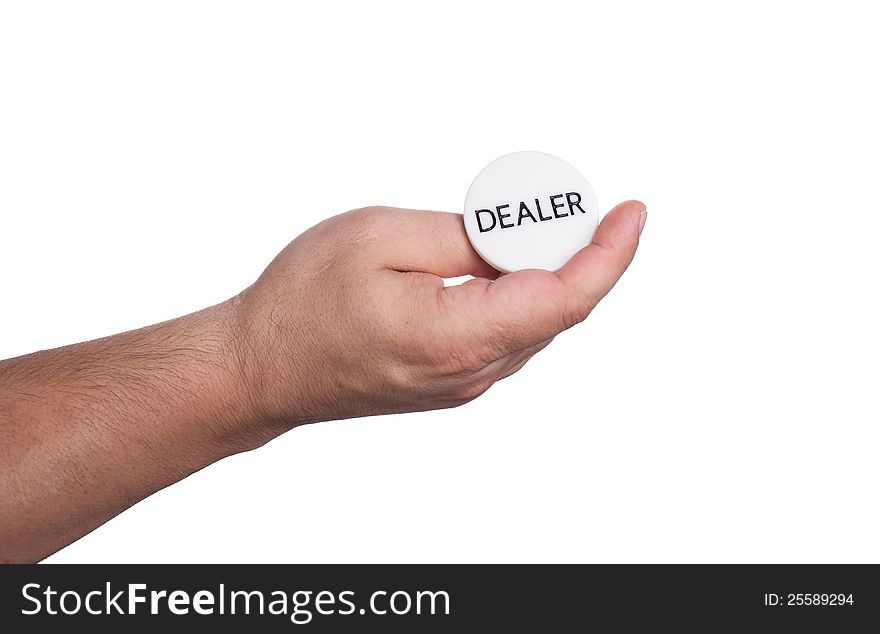 The hand with the dealer button isolated on white