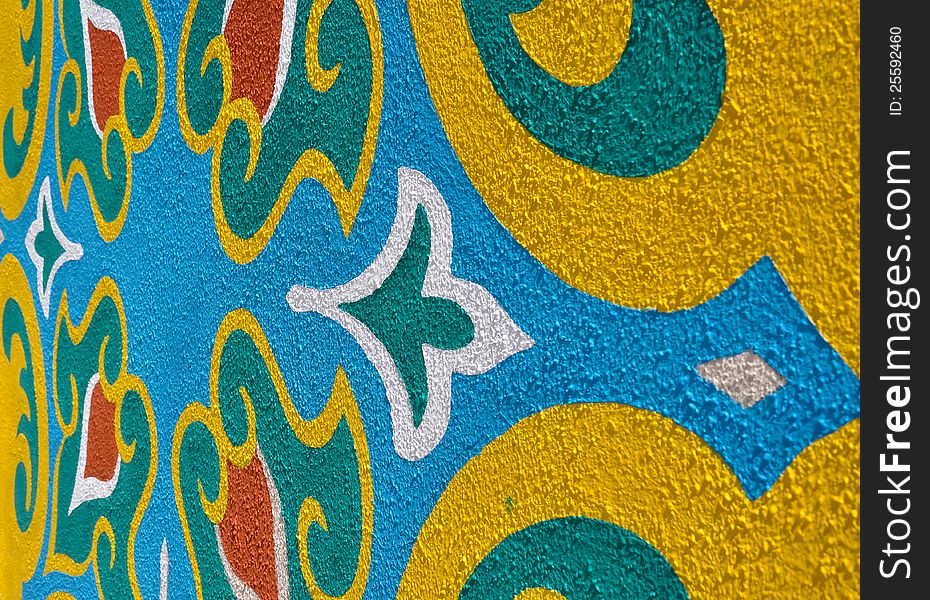Islamic pattern painted on a textured wall and photographed from the side. Islamic pattern painted on a textured wall and photographed from the side