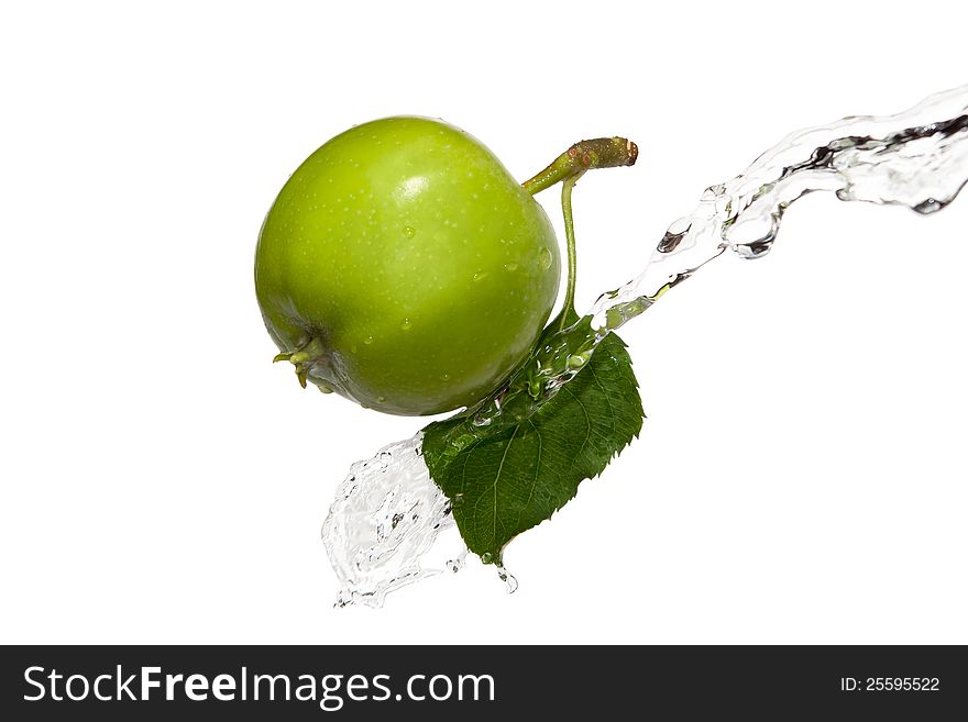 Green apple with a leaf in water. Green apple with a leaf in water