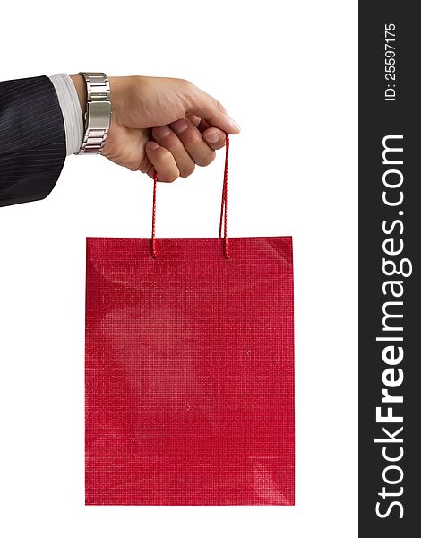 Businessman holding red gift bag