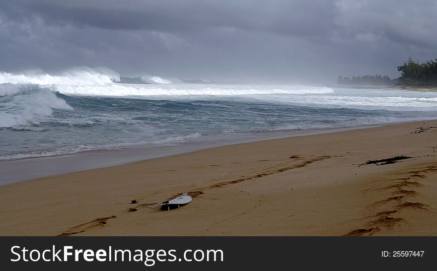 Surf board on shore in Oahu north shore. Surf board on shore in Oahu north shore