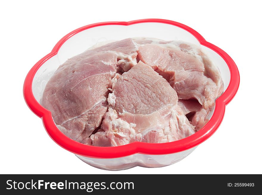 Fresh raw meat in a plastic bowl