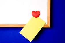 White-board With Yellow Note Royalty Free Stock Photo