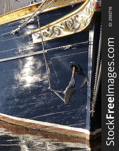 A close up of the waterline of a beautifully crafted sailing ship. A close up of the waterline of a beautifully crafted sailing ship