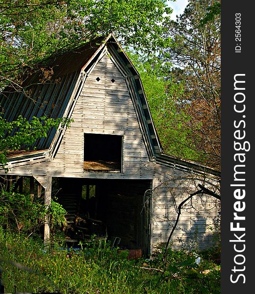 This is a picture of an old barn in the yard.