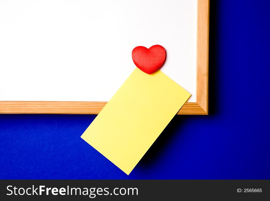 Whiteboard with empty yellow post-it note and magnet in the form of a hart.white-board with empty yellow post-it note and magnet ready for a message.please take a look at my other images of this item. Whiteboard with empty yellow post-it note and magnet in the form of a hart.white-board with empty yellow post-it note and magnet ready for a message.please take a look at my other images of this item