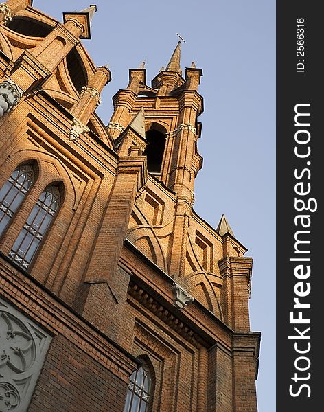 Catholic Church of red brick. The Gothic style. Catholic Church of red brick. The Gothic style