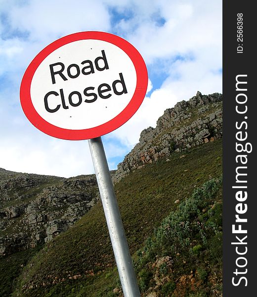 Portrait photo of a road closure sign. Portrait photo of a road closure sign.