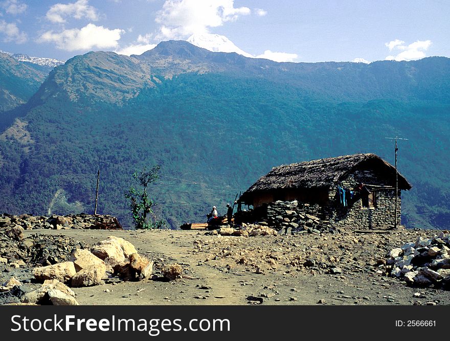 A hut built admist mountainous background in Nepal. A hut built admist mountainous background in Nepal