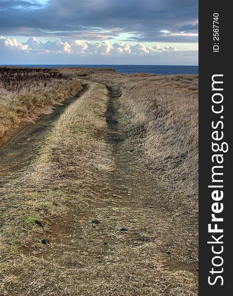 HDR photo of local road along coastline.