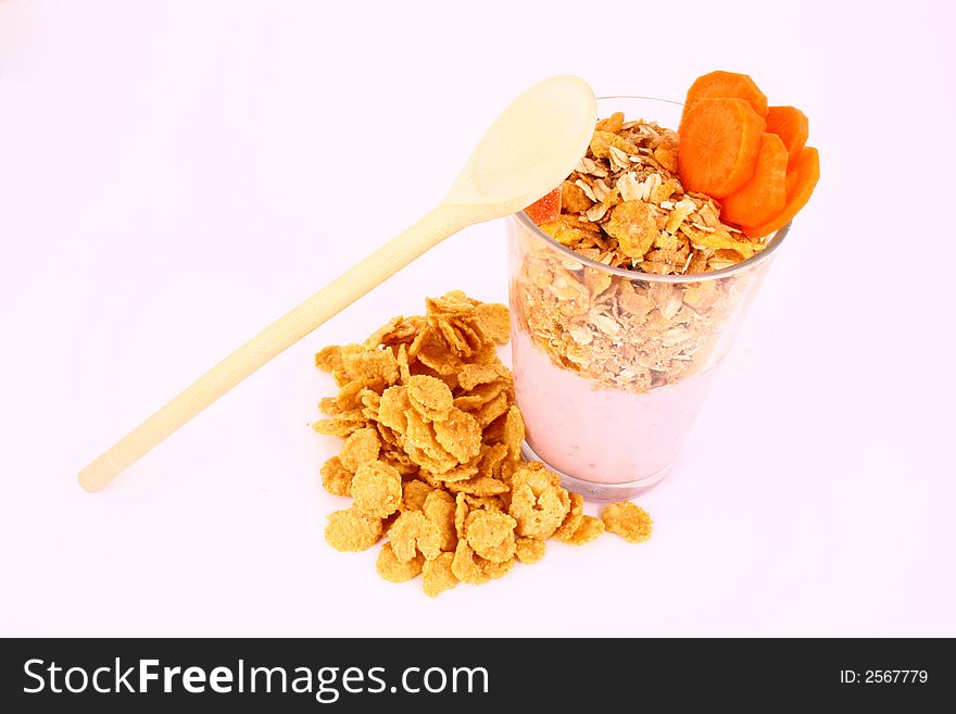 A bowl full of granola isolated on white background. A bowl full of granola isolated on white background