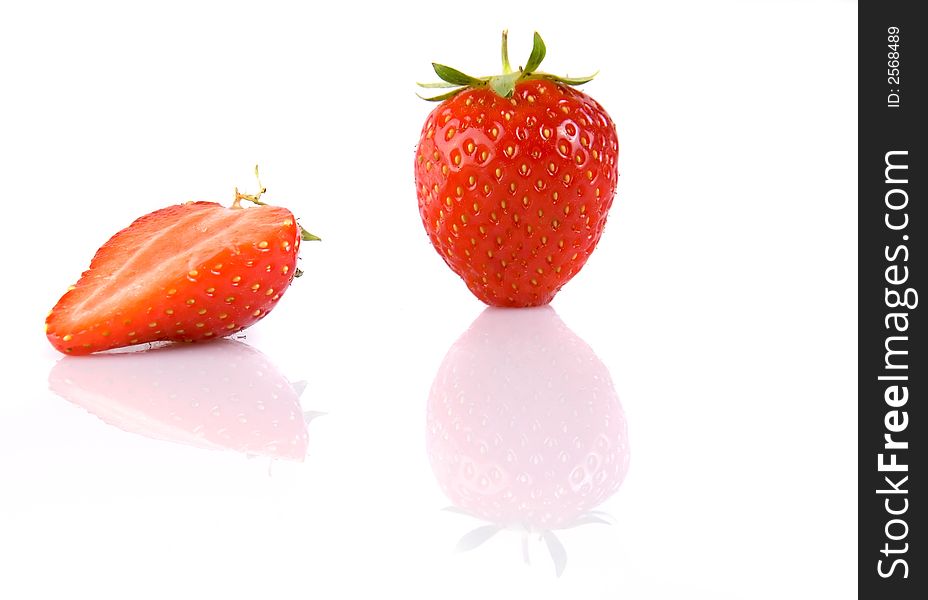 Full and sliced strawberry