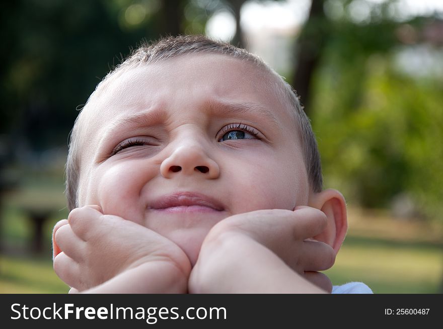 Portrait of little boy in the park