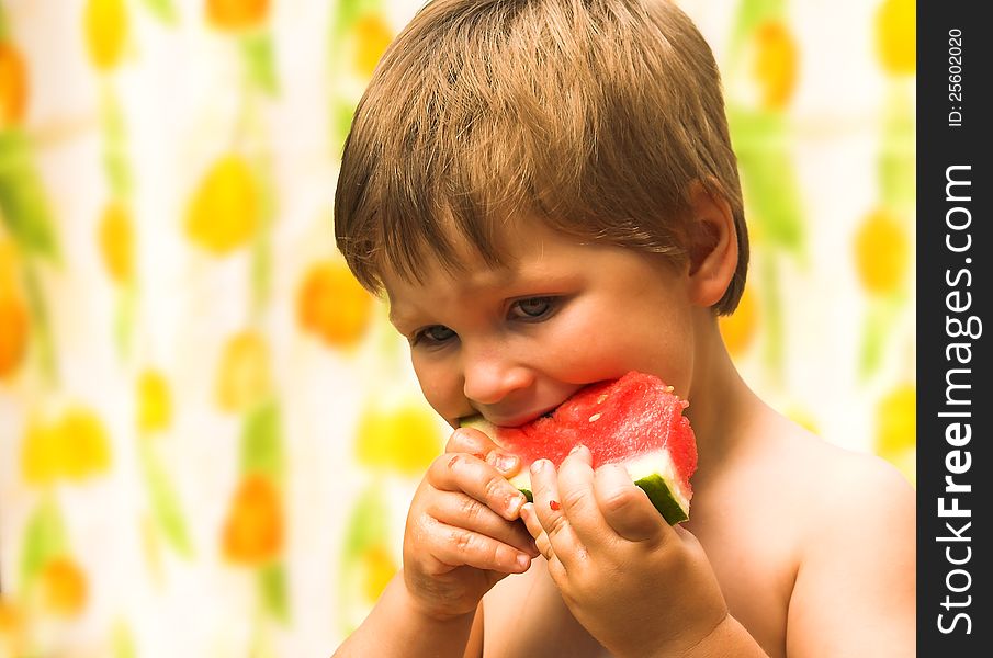 Boy Eating A Watermelon