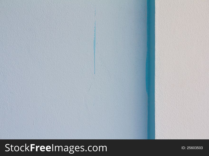 Blue In The Details Of The Concrete Wall.