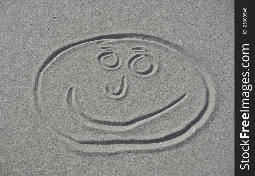 A happy face on the beach. A happy face on the beach