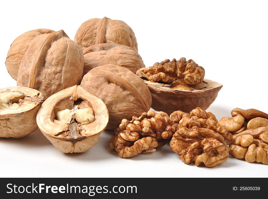 Brown walnuts isolated on white background