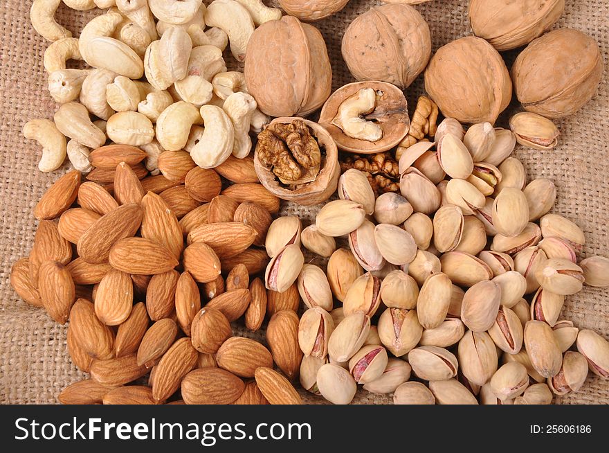 Assorted nuts (almonds, pistachio, walnuts, cashews) close up
