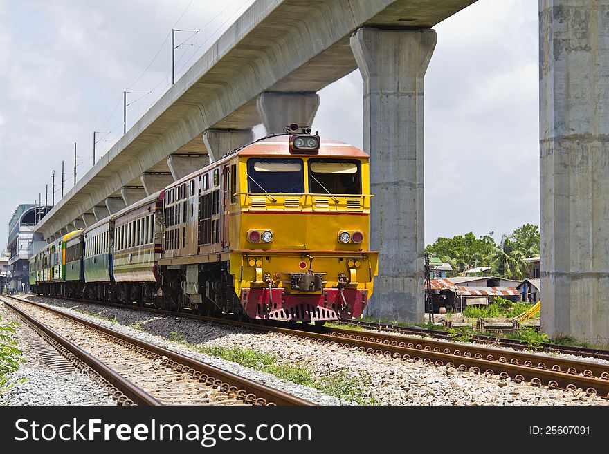 Train and sky train (airport link train) railroad, Bangkok, Thailand, mass transportation concept. Train and sky train (airport link train) railroad, Bangkok, Thailand, mass transportation concept