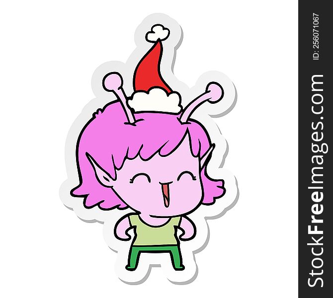 hand drawn sticker cartoon of a alien girl laughing wearing santa hat