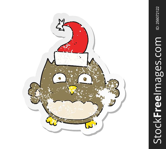 Retro Distressed Sticker Of A Cartoon Owl Wearing Christmas Hat