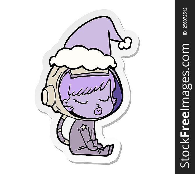 sticker cartoon of a pretty astronaut girl sitting waiting wearing santa hat