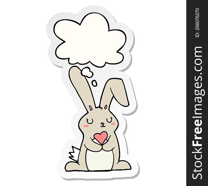 cartoon rabbit in love with thought bubble as a printed sticker