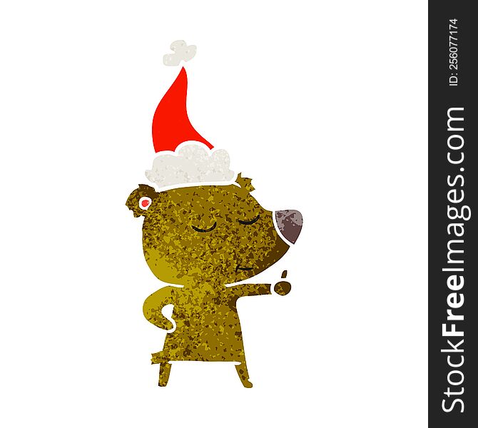 happy hand drawn retro cartoon of a bear giving thumbs up wearing santa hat
