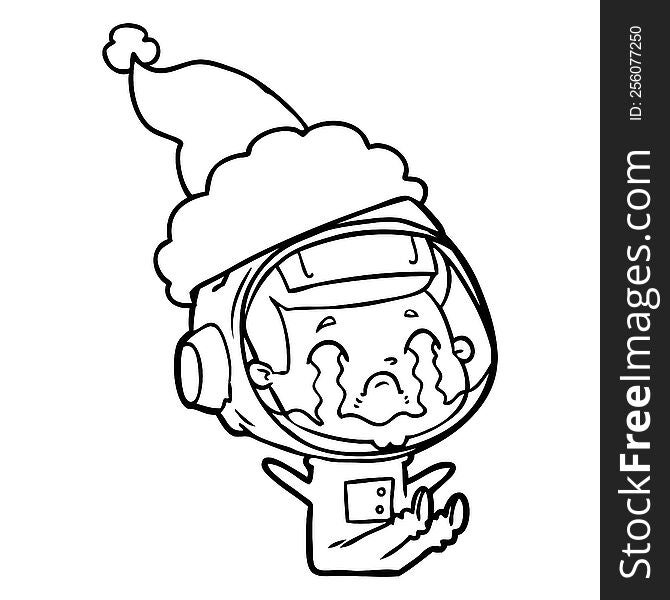 hand drawn line drawing of a crying astronaut wearing santa hat