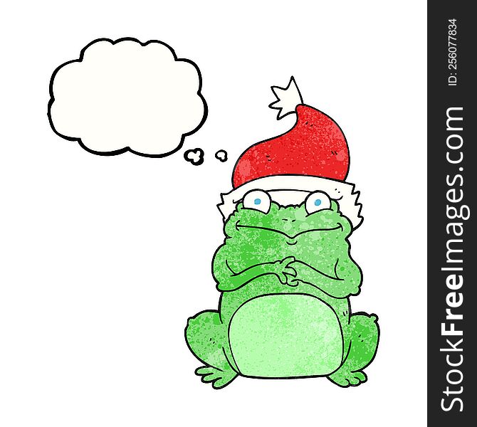 freehand drawn thought bubble textured cartoon frog wearing christmas hat