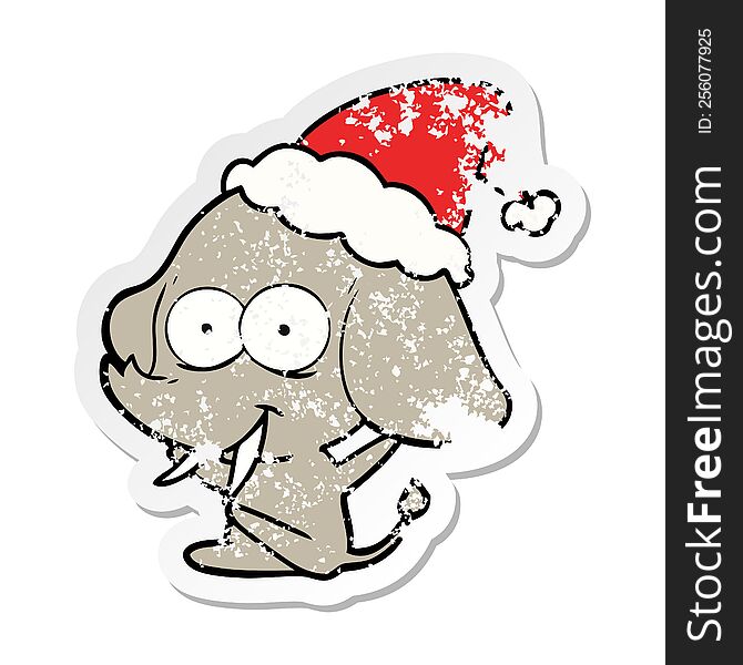 Happy Distressed Sticker Cartoon Of A Elephant Wearing Santa Hat