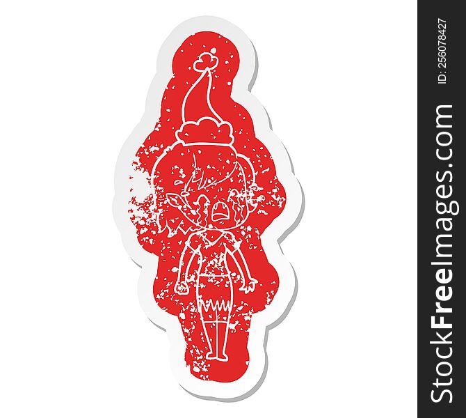 Cartoon Distressed Sticker Of A Crying Vampire Girl Wearing Santa Hat