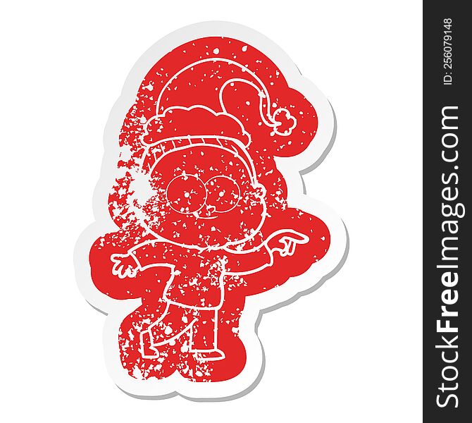 Cartoon Distressed Sticker Of A Happy Old Woman Wearing Santa Hat
