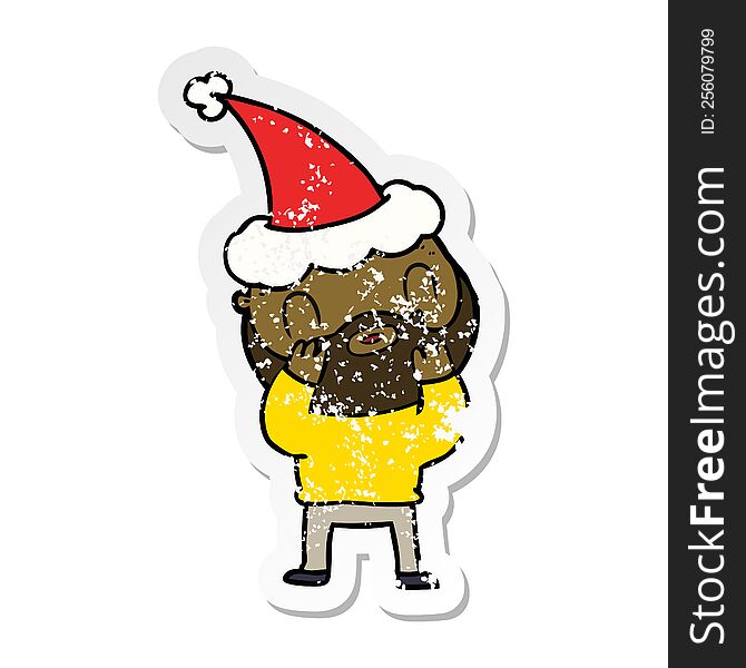 Distressed Sticker Cartoon Of A Bearded Man Wearing Santa Hat