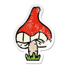 Distressed Sticker Cartoon Doodle Of A Single Mushroom Stock Photography