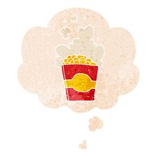 Cartoon Popcorn And Thought Bubble In Retro Textured Style Royalty Free Stock Photos