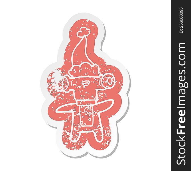 Friendly Cartoon Distressed Sticker Of A Alien Wearing Santa Hat