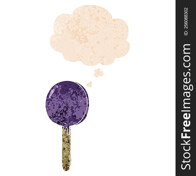 cartoon lollipop with thought bubble in grunge distressed retro textured style. cartoon lollipop with thought bubble in grunge distressed retro textured style