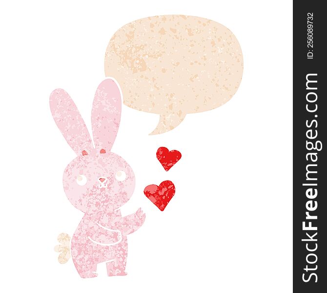 cute cartoon rabbit with love hearts and speech bubble in retro textured style