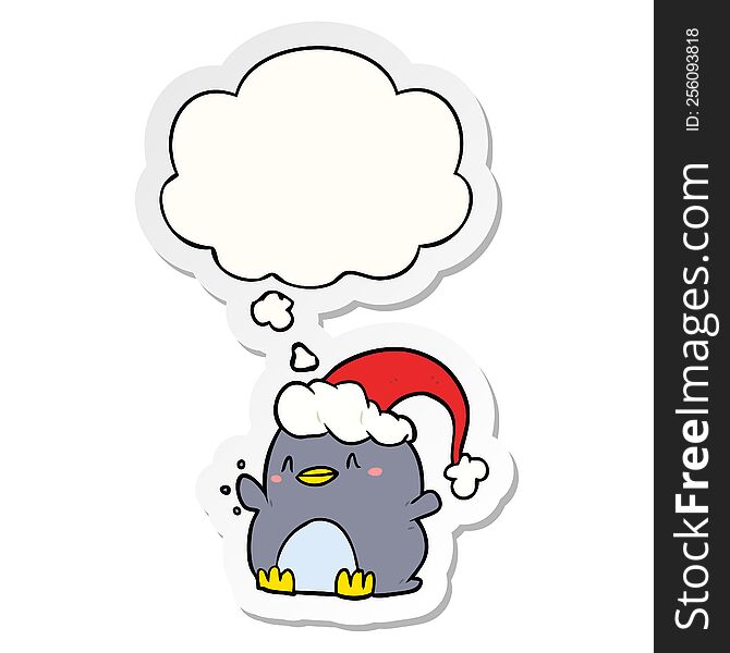Cartoon Penguin Wearing Christmas Hat And Thought Bubble As A Printed Sticker