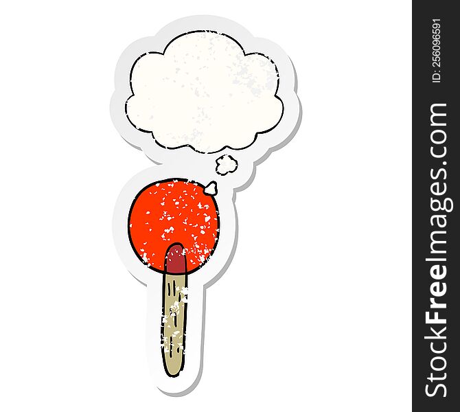 cartoon candy lollipop with thought bubble as a distressed worn sticker