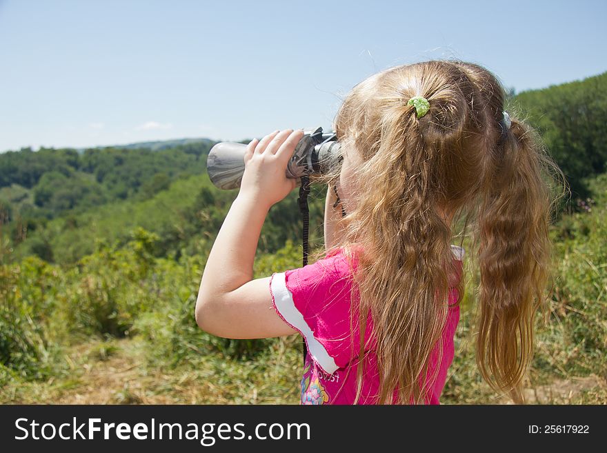 Child and nature. Environment supervision in the field-glass.