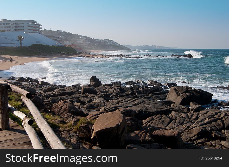 The coastline at Ballito, KwaZulu-Natal Noth coast, South Africa, with beaches interspersed with rocky outcrops, and holiday accommodation in the distance. The coastline at Ballito, KwaZulu-Natal Noth coast, South Africa, with beaches interspersed with rocky outcrops, and holiday accommodation in the distance.