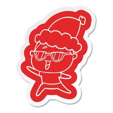 Cartoon  Sticker Of A Happy Woman Wearing Spectacles Wearing Santa Hat Stock Images