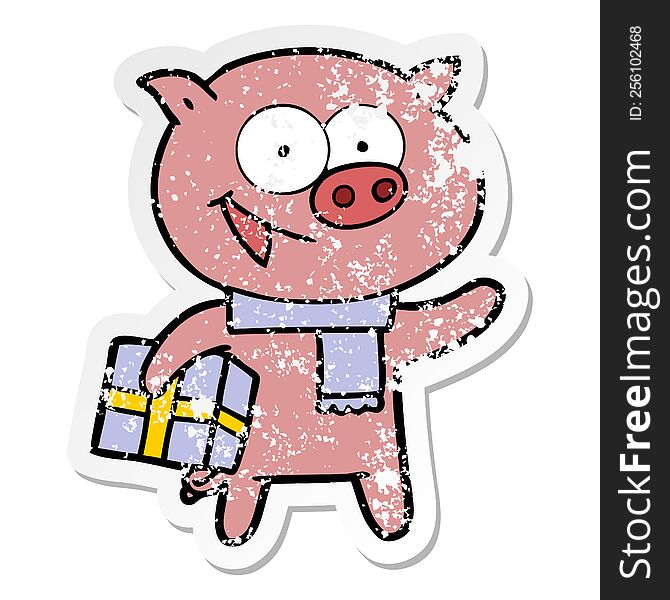 distressed sticker of a cheerful pig with christmas gift