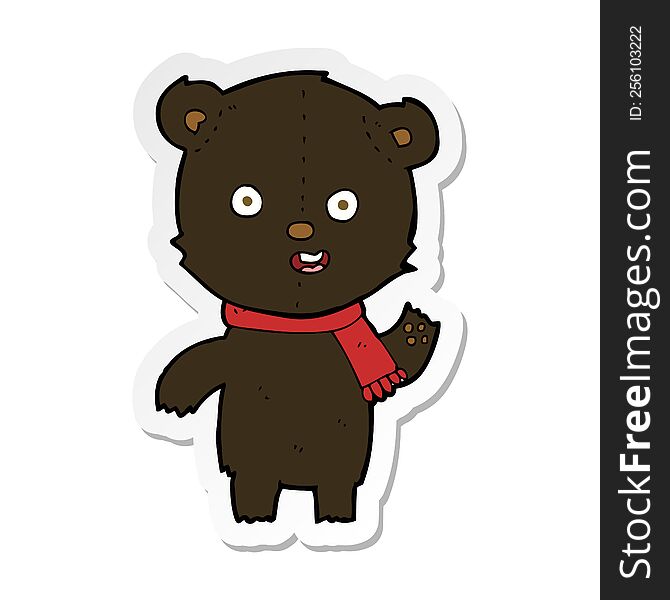 Sticker Of A Cartoon Waving Black Bear Cub With Scarf