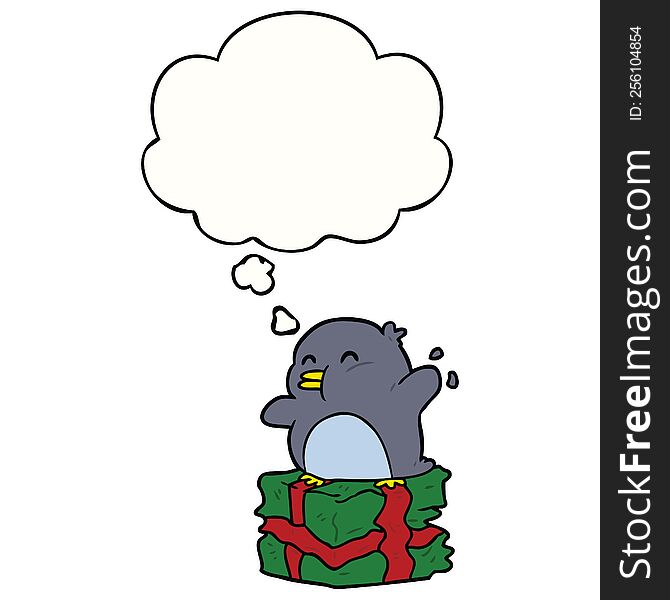 Cartoon Penguin On Present And Thought Bubble