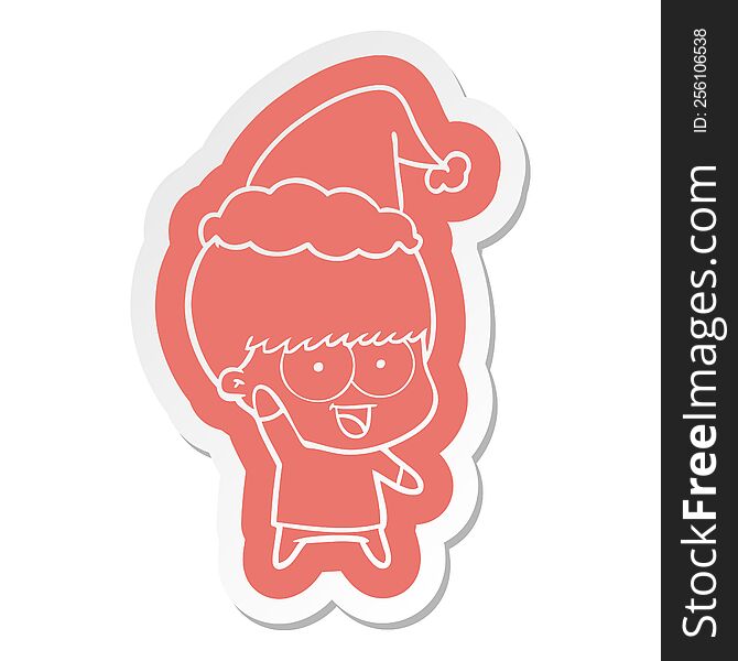 Happy Cartoon  Sticker Of A Boy Waving Wearing Santa Hat